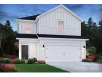 Charming two-story home with a two-car garage, black roof, and white siding nestled on a well-manicured lawn at 5020 Poplin Vly, Cherryville, NC 28021