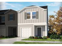 Charming two-story home with gray siding, one-car garage, and a welcoming front door at 3790 Backwater St, Concord, NC 28027