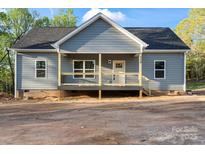 Charming single-story home with a covered porch and gray siding at 524 Waco Rd, Kings Mountain, NC 28086