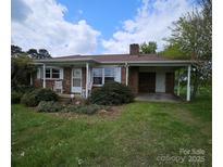 Charming single-story brick home with covered parking and inviting front porch at 1217 Stony Point Rd, Kings Mountain, NC 28086