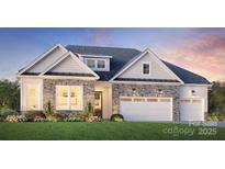 Charming single-story home showcasing a stone facade, dormer window, and a two-car garage at 5020 Mint Harbor Way # 0399, Charlotte, NC 28269