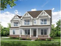 New construction two story home with craftsman details, three gables, covered porch, and brick accents at Tbd Boomer Ct # 9, Statesville, NC 28677