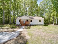 Charming single-story home with a welcoming front porch and beautiful natural wood accents at 1241 Pitts Rd, Chester, SC 29706