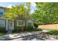 Charming townhome with mature landscaping, stone accents, and a welcoming front entrance at 643 Brickdust Ct, Fort Mill, SC 29708