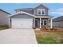 Charming two-story home featuring a two-car garage and inviting front porch at 1240 Morehead Dr, Salisbury, NC 28144