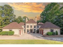 Stunning home with large lawn, circular drive, and attached garages at 3005 Dream Catcher Cir, Fort Mill, SC 29715