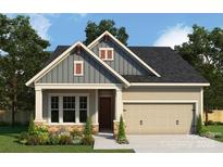 Charming craftsman-style home with a two-car garage, lovely landscaping, and eye-catching architectural details at 1107 Meander Ln, Waxhaw, NC 28173