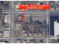 Aerial view of a .58 acre lot with a SF home & 3 commercial units at 103 E Main St, Dallas, NC 28034
