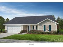 Charming one-story home with stone accents, green shutters and attached two car garage at Lot#143 Norwood Ct, Denver, NC 28037