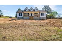Charming new construction featuring a welcoming front porch and classic design on a spacious lot at 504 Christopher Ln, Chester, SC 29706