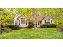Charming single-story home with manicured lawn and mature trees enhancing curb appeal at 2199 Lookout Pt, Rock Hill, SC 29732