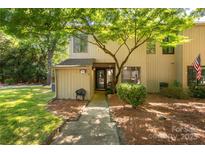 Charming townhome featuring mature trees and landscaped front entrance at 194 Riverview Ter, Clover, SC 29710