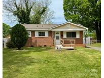 Charming brick home with a well-maintained front yard and classic white trim at 4623 Monmouth Dr, Charlotte, NC 28269
