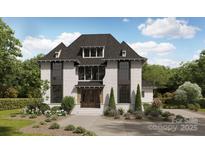 Stunning two-story home boasts elegant design, black framed windows, and a welcoming entrance, surrounded by lush landscaping at 1437 Montford Dr, Charlotte, NC 28209
