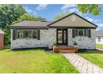 Charming renovated home with a brick facade, new landscaping, and inviting front entrance at 112 Circle Dr, Salisbury, NC 28144