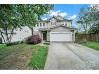 Charming two-story home with a well-maintained front yard and a two-car garage at 656 Hosta Dr, Fort Mill, SC 29715