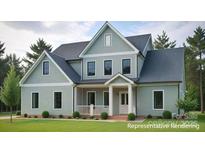Charming two-story home with a covered porch, black trim windows, and a landscaped front yard at 122 Huntcliff Dr, Statesville, NC 28677