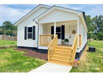 Charming single-story home with a welcoming front porch and newly installed stairs at 159 Hallman St, Cherryville, NC 28021