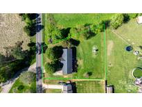 Aerial view of the property with outlined boundaries, showcasing its prime location and spacious yard at 5184 Swinging Bridge Rd, Conover, NC 28613