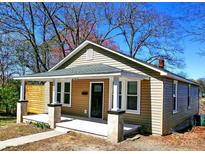 Charming single-story home with a covered front porch and neutral siding at 606 Childs St, Lincolnton, NC 28092