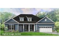 Charming, single-story home with blue siding, a black roof, dormers, columns, and an attached two-car garage at 124 Adalyn Ivy Ln # 4, Mooresville, NC 28115