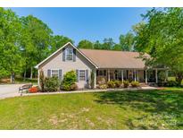 Charming ranch-style home with well-maintained lawn and inviting front porch at 1374 Weatherby Dr, Salisbury, NC 28146