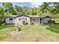 Charming single-story home with stone accents and a well-maintained front yard at 20337 Nc Hwy 73 Hwy, Albemarle, NC 28001