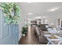 Open floor plan with view of the kitchen and living room area at 1062 River Haven Sw Ave, Concord, NC 28025