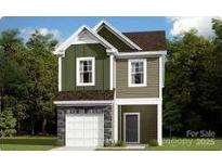Charming two-story home featuring a modern design, neutral colors, and inviting curb appeal at 1133 Overbrook Pl, Wingate, NC 28174