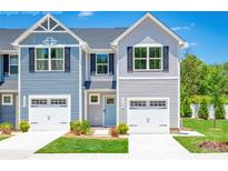 Charming two-story townhome with a one-car garage and well-maintained landscaping at 2067 Stephens Farm Dr # C, China Grove, NC 28023
