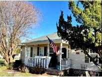 Charming single-story home with a welcoming porch and well-maintained landscaping at 2473 Greenwood Rd, Rock Hill, SC 29730