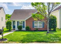 Charming single-story home featuring a well-manicured lawn and inviting curb appeal at 1526 Tuckers Glenn Dr, Rock Hill, SC 29732