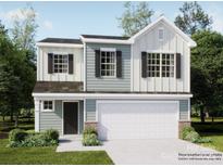 Charming two-story home with a two-car garage, black shutters, and a mix of vertical and horizontal siding at 2106 Columbidae Ln, Gastonia, NC 28052