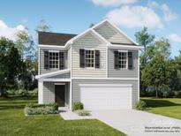 Charming two-story home with gray siding, dark shutters, and an attached two-car garage in a landscaped front yard at 134 Dorian Pl, Troutman, NC 28166