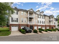 Inviting townhome showcases a blend of classic architecture and modern features at 3158 Walnut Park Dr, Charlotte, NC 28262