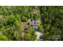 Expansive aerial view of the property showcasing lush green surroundings at 6758 Zion Church Rd, Concord, NC 28025
