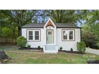 Charming home featuring a well-maintained front yard with fresh landscaping and a welcoming facade at 331 5Th Se Ave, Hickory, NC 28602