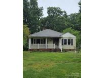 Ranch style home with a covered front porch and visible fire damage at 721 S Spruce St, Rock Hill, SC 29730