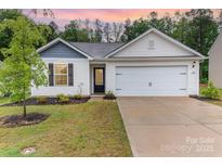 Charming home featuring white siding, a gray shingled roof, and an attached two-car garage at 3138 Maple Ridge Dr, Gaston, NC 28052