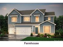 Charming two-story home featuring a two-car garage, manicured lawn, and classic farmhouse-style architecture at 113 Jentri Way, Mooresville, NC 28115