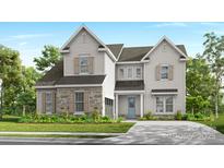 Charming two-story home featuring stone accents, shutters, and a welcoming blue front door at 15743 Sweet Virginia Ln, Huntersville, NC 28078