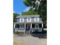 Charming two-story home with a welcoming front porch and classic architectural details at 309 N Congress N St, York, SC 29745