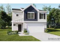 Charming two-story home featuring a two-car garage, a welcoming front porch, and a combination of siding and stone accents at 151 Astor St, Troutman, NC 28166