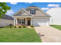 Charming single-Gathering home with well-manicured lawn and attached garage at 4527 Dover Ct, Denver, NC 28037