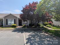 Charming single story home featuring tasteful landscaping, ample parking, and a welcoming entrance at 711 4Th Sw Ave # B3, Conover, NC 28613