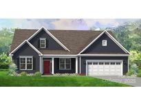 Charming single-story home with a red door, neutral siding, white trim, a two car garage, and a well-manicured lawn at 6938 Glen Abby Ln # 36, Mount Pleasant, NC 28124