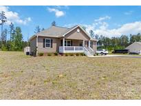 Charming ranch-style home with a covered front porch and well-maintained yard at 3015 Great Falls Hwy, Chester, SC 29014