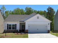 Charming single-Gathering home with white siding, a two-car garage, and a well-manicured front lawn at 1532 Doran Ter, Richburg, SC 29729
