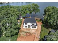 New construction home boasting modern design near the water at 242 Shoreline Loop, Mooresville, NC 28117
