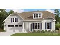 Charming, light two-story home with a two-car garage, manicured lawn, and beautiful curb appeal at 3099 Trace Meadow Ct, York, SC 29745